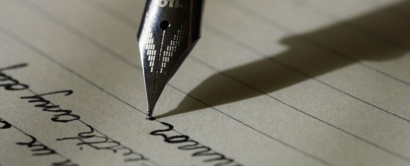 fountain pen nib on paper {{brizy_dc_image_alt entityId=